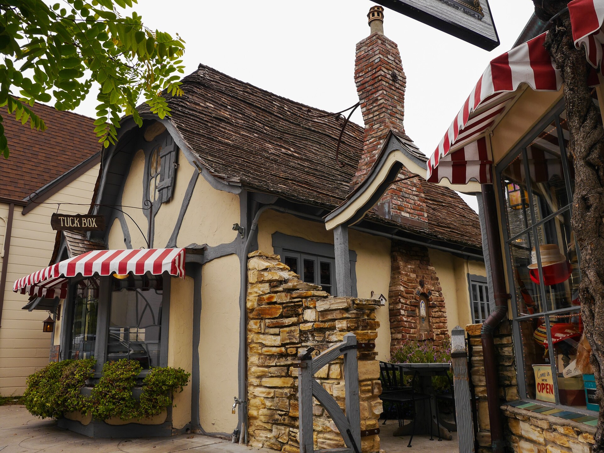 The swoop-roofed storybook facade of the Tuck Box on Dolores Street in Carmel