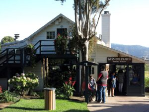 The white farmhouse and barns of Mission Ranch in Carmel-by-the-Sea