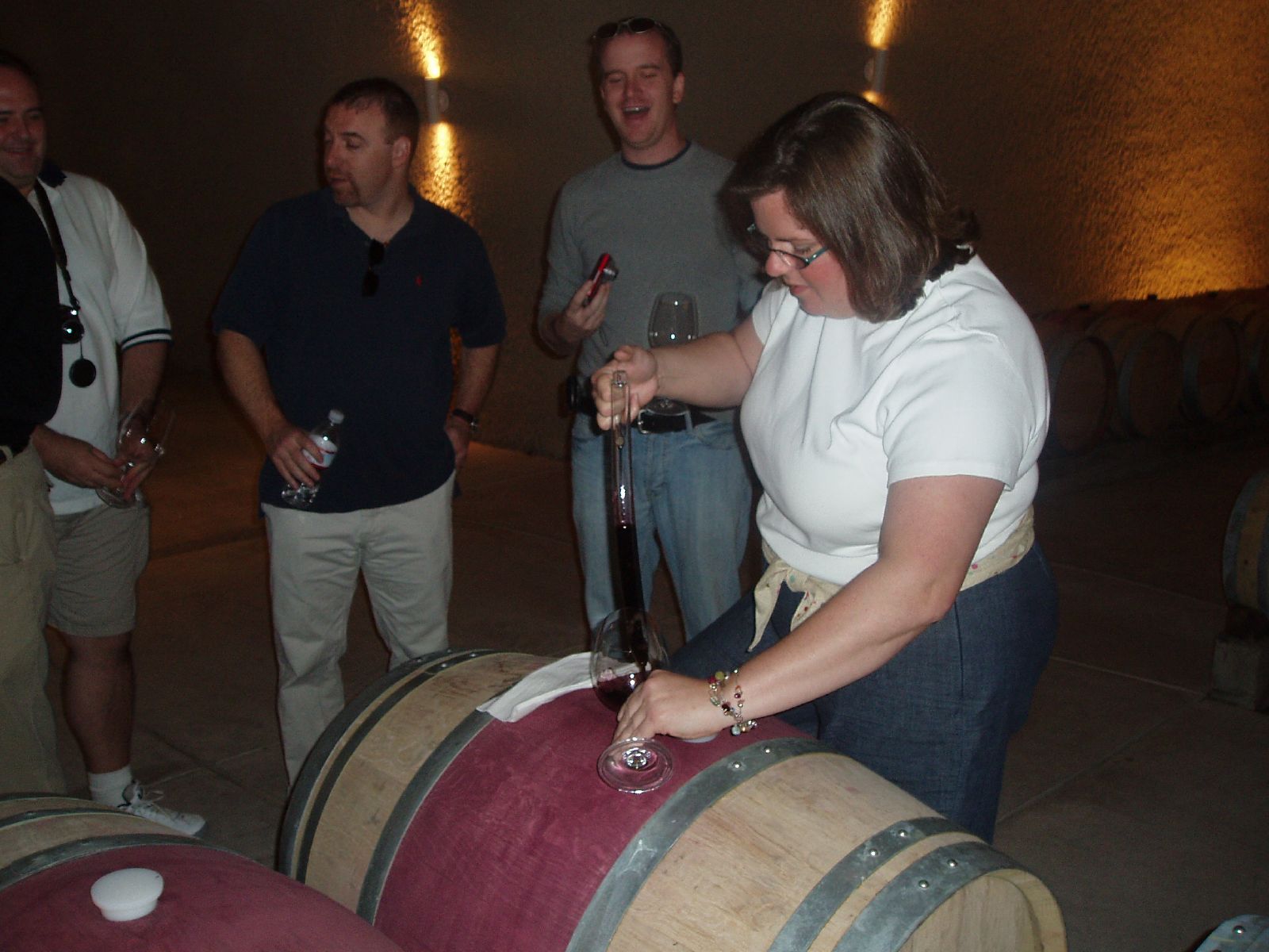 Wine drawn from the barrel into glasses at a tasting.