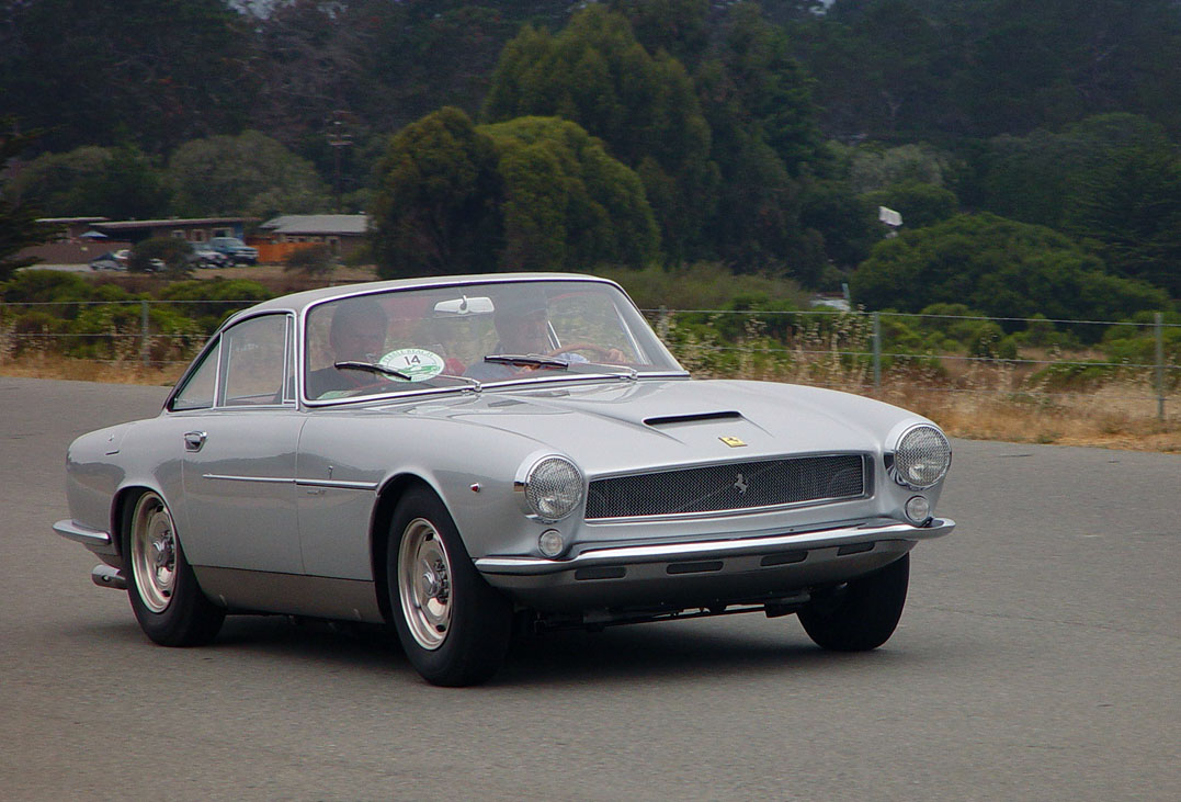A 1960 Ferrari 250 GT SWB with coachbuilt Bertone bodywork on the Pebble Beach Tour d'Elegance.